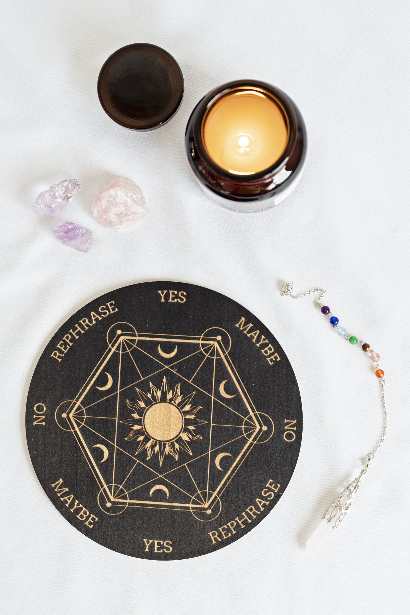 Pendulum board for divination, fortune telling or communicating with spirits